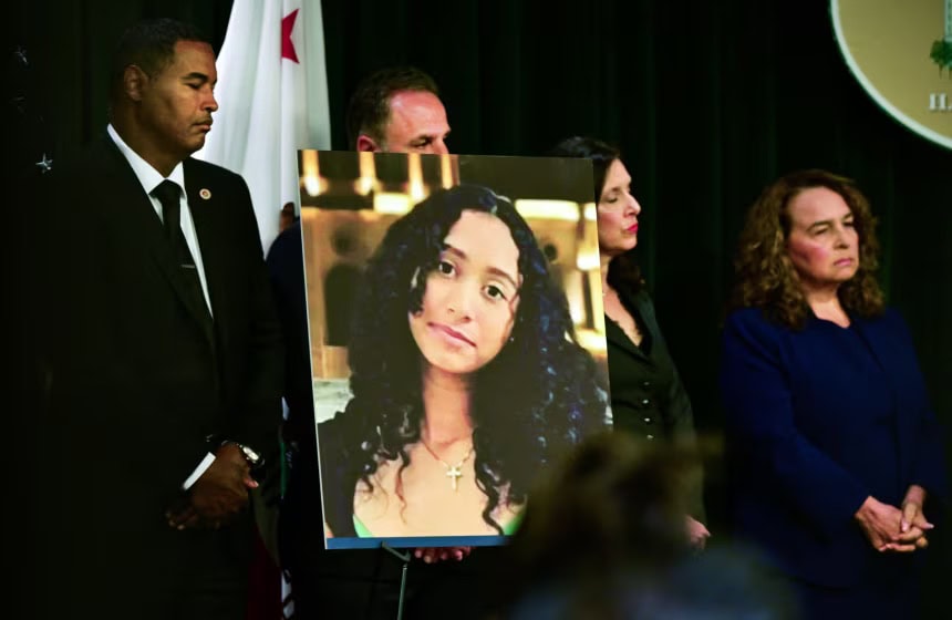 Portrait of Celeste Rivas Hernandez displayed during a press briefing.